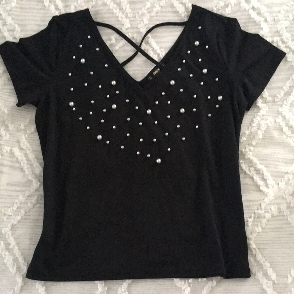 Black top with decorative pearls